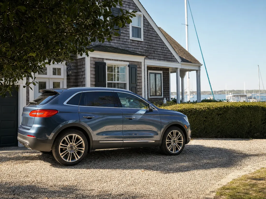 Crossover beside a shingled home in Annapolis Maryland with a glimpse of masts and harbor water beyond the hedge - selling a car in Annapolis