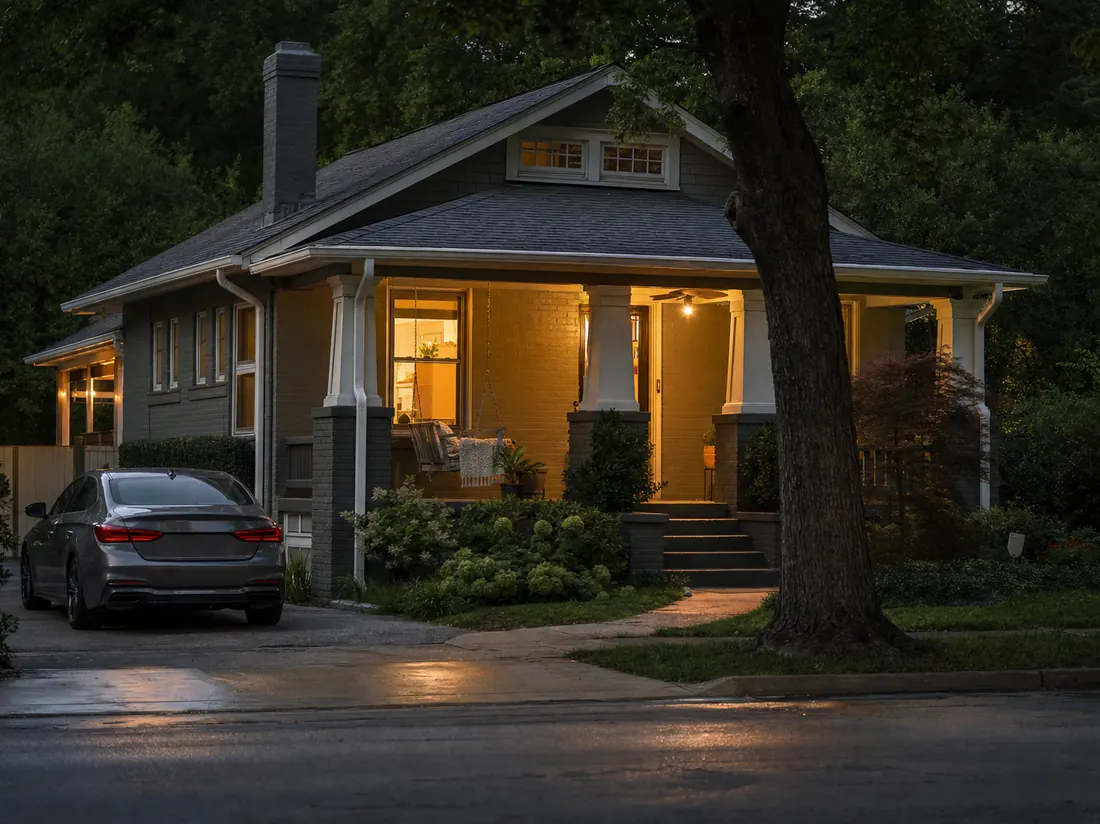 Sedan at a Nashville craftsman bungalow with a porch swing - selling a car in Nashville